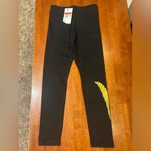 Nike leggings brand new with tags black/gold youth large